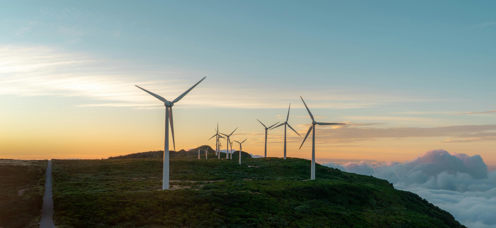 Header image of a windfarm on a hilltop