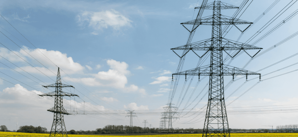 Header image of power lines against a blue sky.